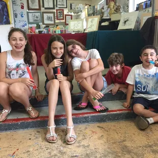 Students taking a break right before prep for the Art Show on the last day of camp