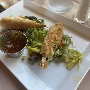 Half eaten Devine light tempura shrimp with apricot dipping sauce