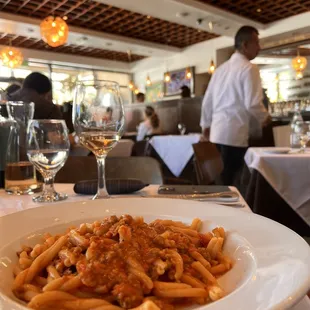 a plate of pasta in a restaurant