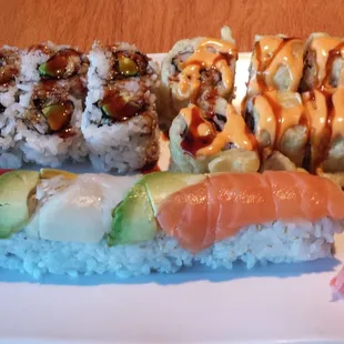 Eel and avocado, tempura crab and shrimp, rainbow rolls