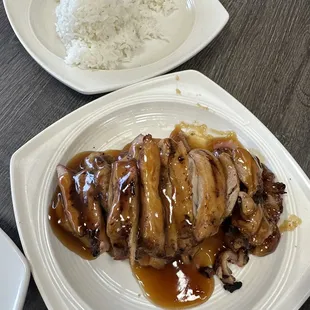 a plate of rice and meat