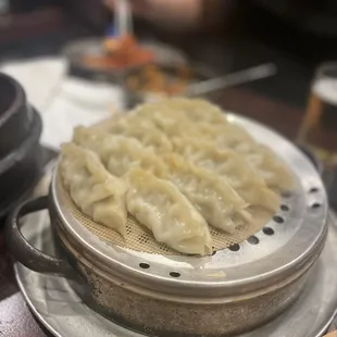a close up of a plate of dumplings