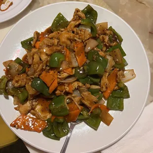 a plate of stir fried vegetables