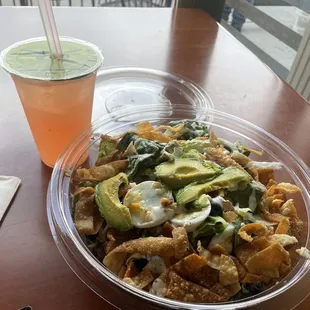 Chicken Salad with egg, bacon, cheese, avocado, olives, wonton strips and ranch. Guava Lemonade