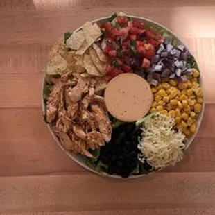 a row of platters of different types of food
