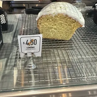 a loaf of cake on a cooling rack