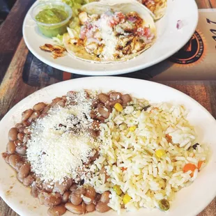two plates of mexican food