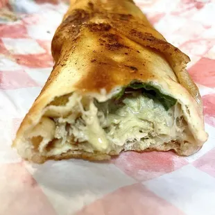 My order of Chicken Tostini stuffed with cheese, spinach and tomatoes. Good flavor and it has a nice crunchy exterior.