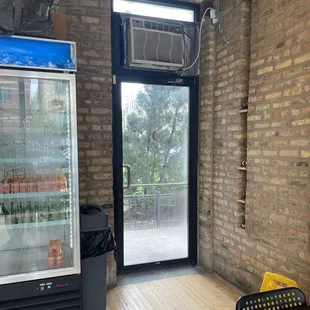 Door to outside patio. The patio is pretty and a great spot for Al fresco dining.