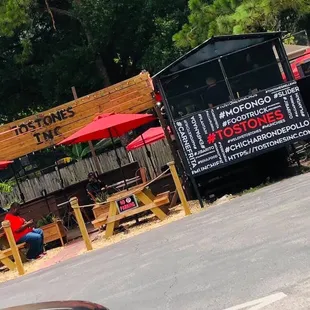 Tables outside that are slightly covered