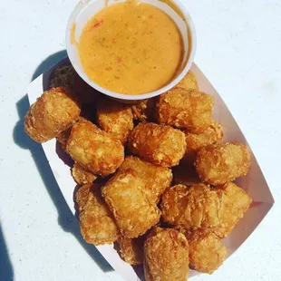 Normal tater tots with nacho cheese