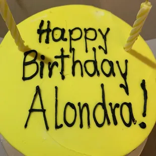 a birthday cake with candles