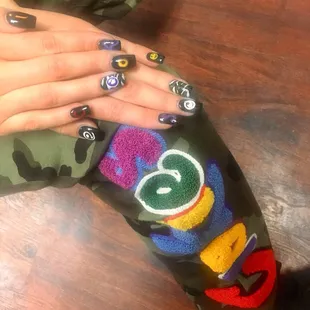 Her nails match her outfit, Cookies Clothing LIT !