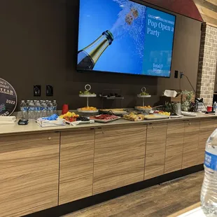 a bar with a large screen