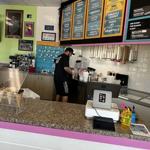 a man standing at a counter