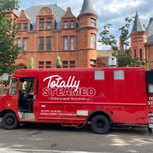 Look for the red truck.  We call it Clifford.