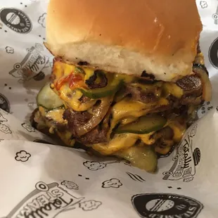 The Sir Arthur- a quadruple stacked Angus beef patty cheeseburger.