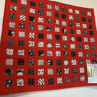 Displayed in shop: sewn up quilt with pattern available.