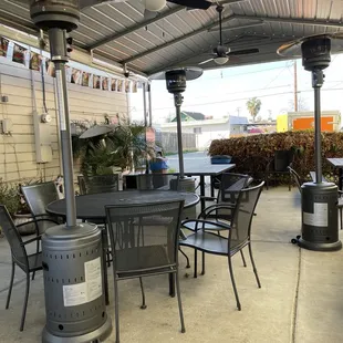 Outdoor dining area with heaters