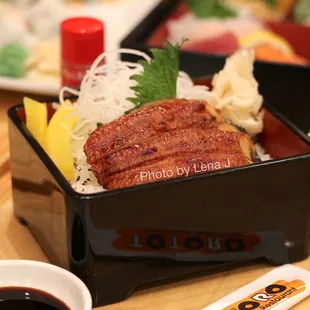 Unagi Don ($20) - grilled river eel topped with eel sauce on a bed of sushi rice. Asked for sauce on the side.