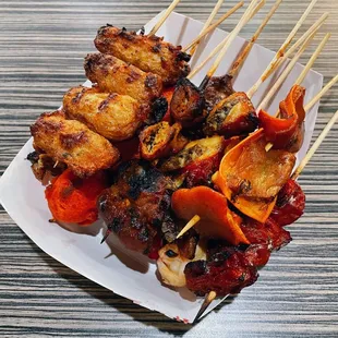 skewered food on a plate