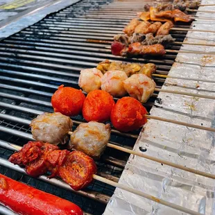 a variety of food on a grill