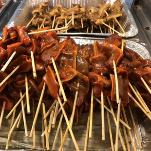 a variety of skewered meats