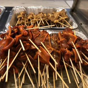 a variety of meat skewers