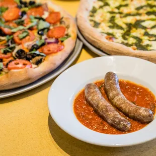 two pizzas and a sausage