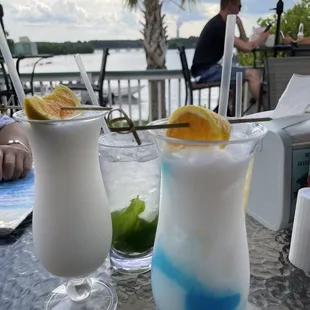 Blue piña colada. PRESENTATION NOT AS DISPLAYED ON COCKTAIL MENU.