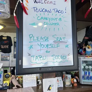 a sign in a restaurant