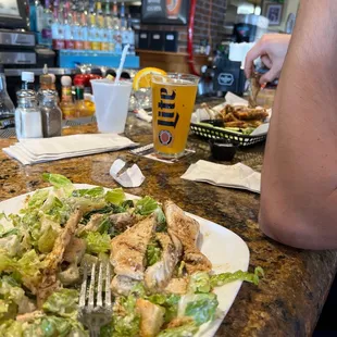 Caesar salad and Jamaican jerk wings