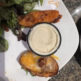 5 ULTRA potato skins for 18.95.  Potato skin is smaller than a chicken wing.  $3.80 each.  Been coming here since they opened 7 years.