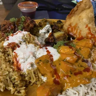 Chicken Biryani, Pakora, Vegetable Samosa, Aloo Baingan, Chicken Makhani, rice, Raita, chutney