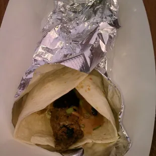 Chorizo stuffed banana, whipped goat cheese, bourbon BBQ aioli taco.