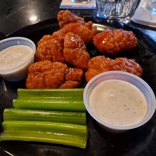 Sweet &amp; Spicy Sriracha Boneless Wings. Expensive but worth it!!! -($10 for 7 very good wings.)