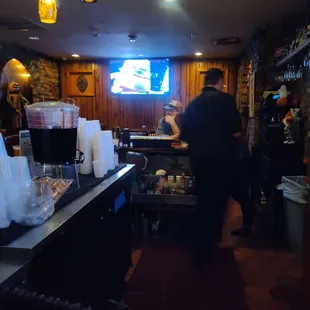 Big screens with sports playing