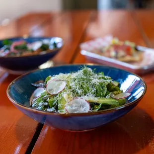 Trio of Dishes, we have salads, sandwiches, pizza, and more