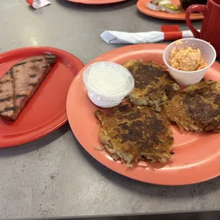 Potato pancakes w/ a side of smoked ham steak &amp; side of sour cream &amp; pimento cheese... delicious!