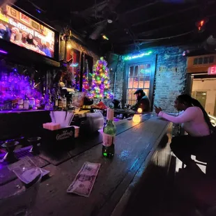 people sitting at the bar