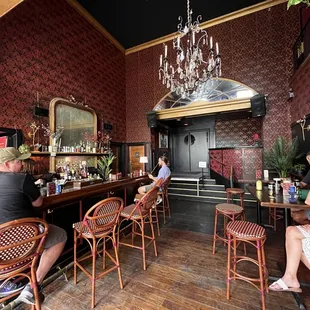 people sitting at the bar