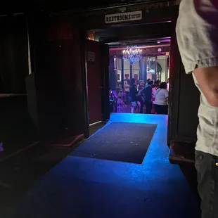 a man standing in front of a stage
