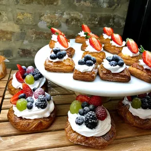 Scrumptious Fruit Pastries with custard and fresh whipped cream.