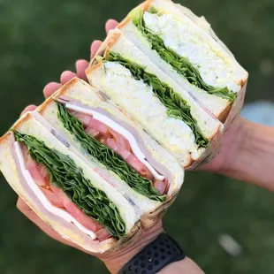 Delicious sandwiches using our freshly baked bread and fresh deli-cut meats! Options: Turkey Avocado Club, Ham and Swiss, Egg Salad + more!