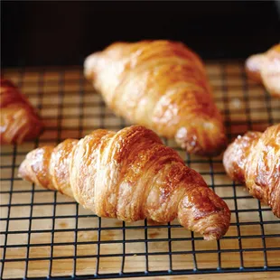 croissants on a cooling rack