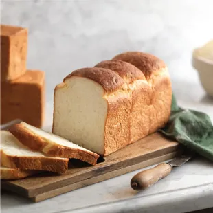 a loaf of bread on a cutting board