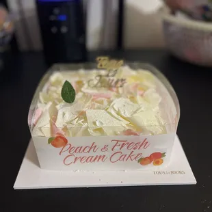 a cake in a plastic container