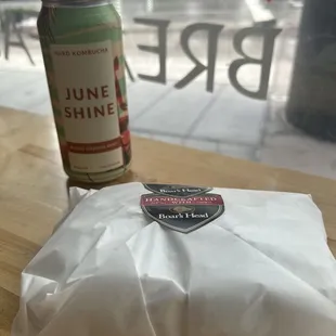 Beverage from the store and a sandwich from the deli counter.