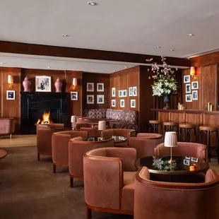 seating and bar area with wood paneling