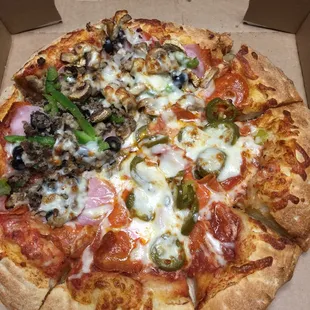 Medium Sicilian crust, half pepperoni jalapeño, half Tower Deluxe, add beef